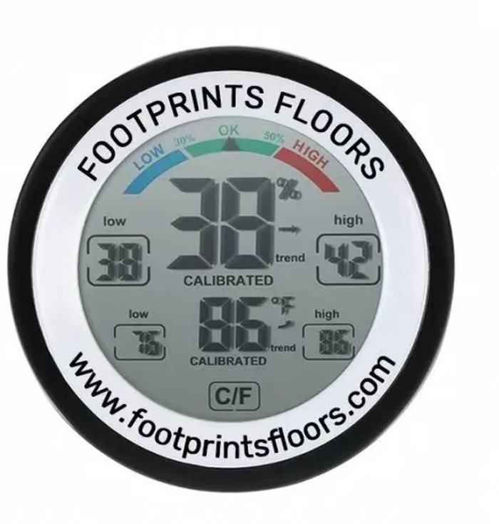 Footprints Floors branded thermo-hygrometer with www.footprintsfloors.com printed on the face