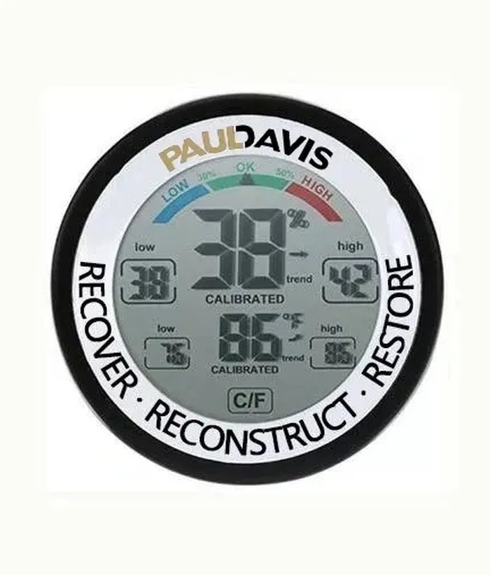 Paul Davis branded thermo-hygrometer with Recover, Reconstruct, Restore printed on the face